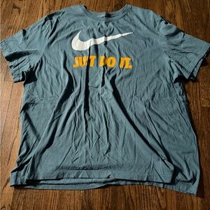 Nike Men's Teal T-Shirt with Swoosh and Slogan